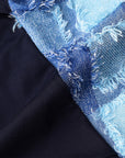 Check Fringe Bubble Sleeve Top