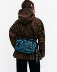 Medium Unikko Sling Bag