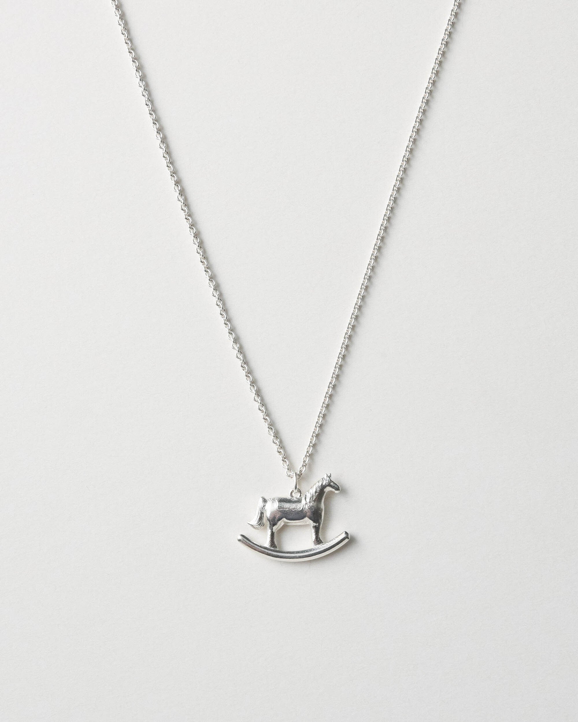 AIDA IMPACT Rocking Horse Silver Necklace