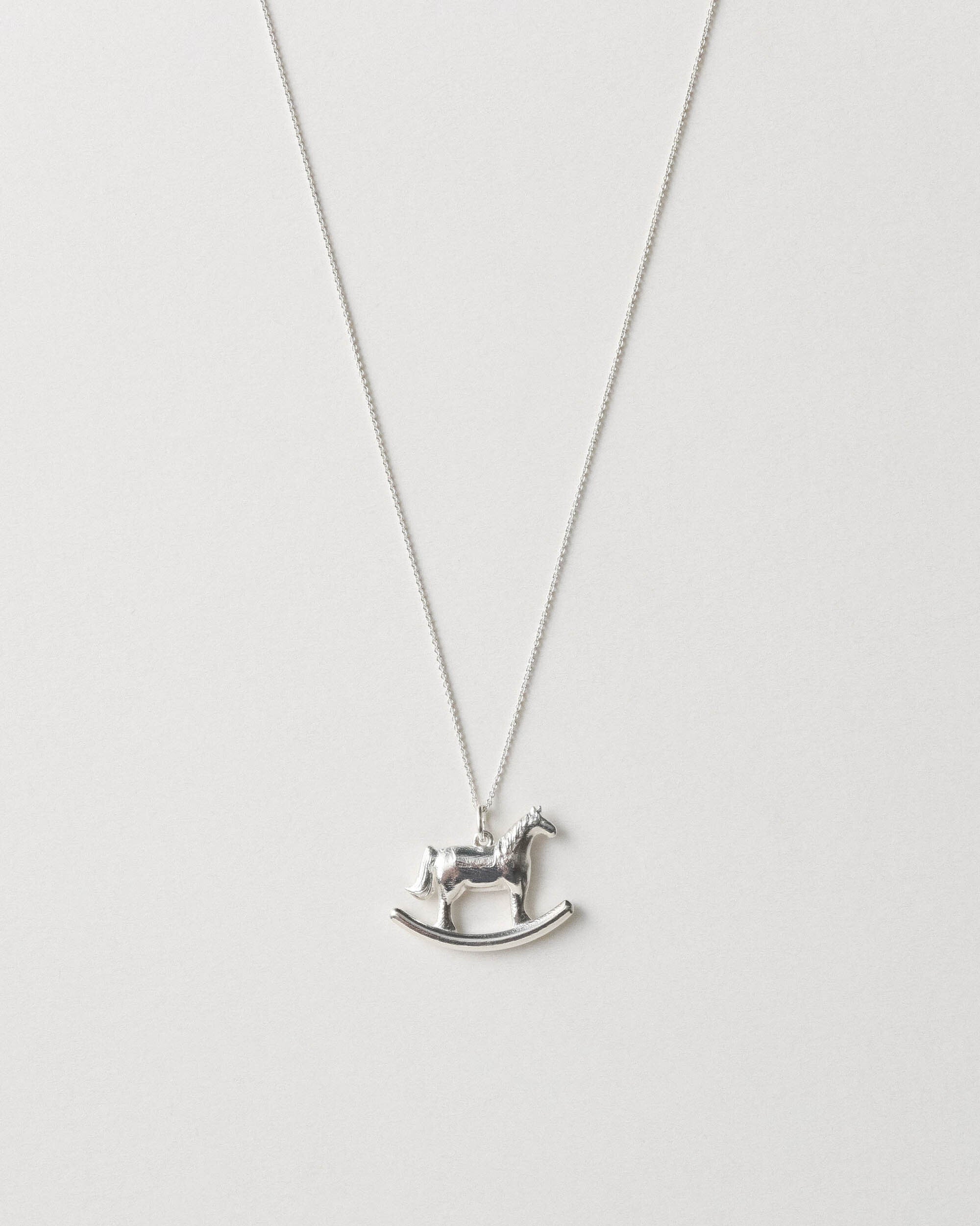 AIDA IMPACT Rocking Horse Silver Necklace