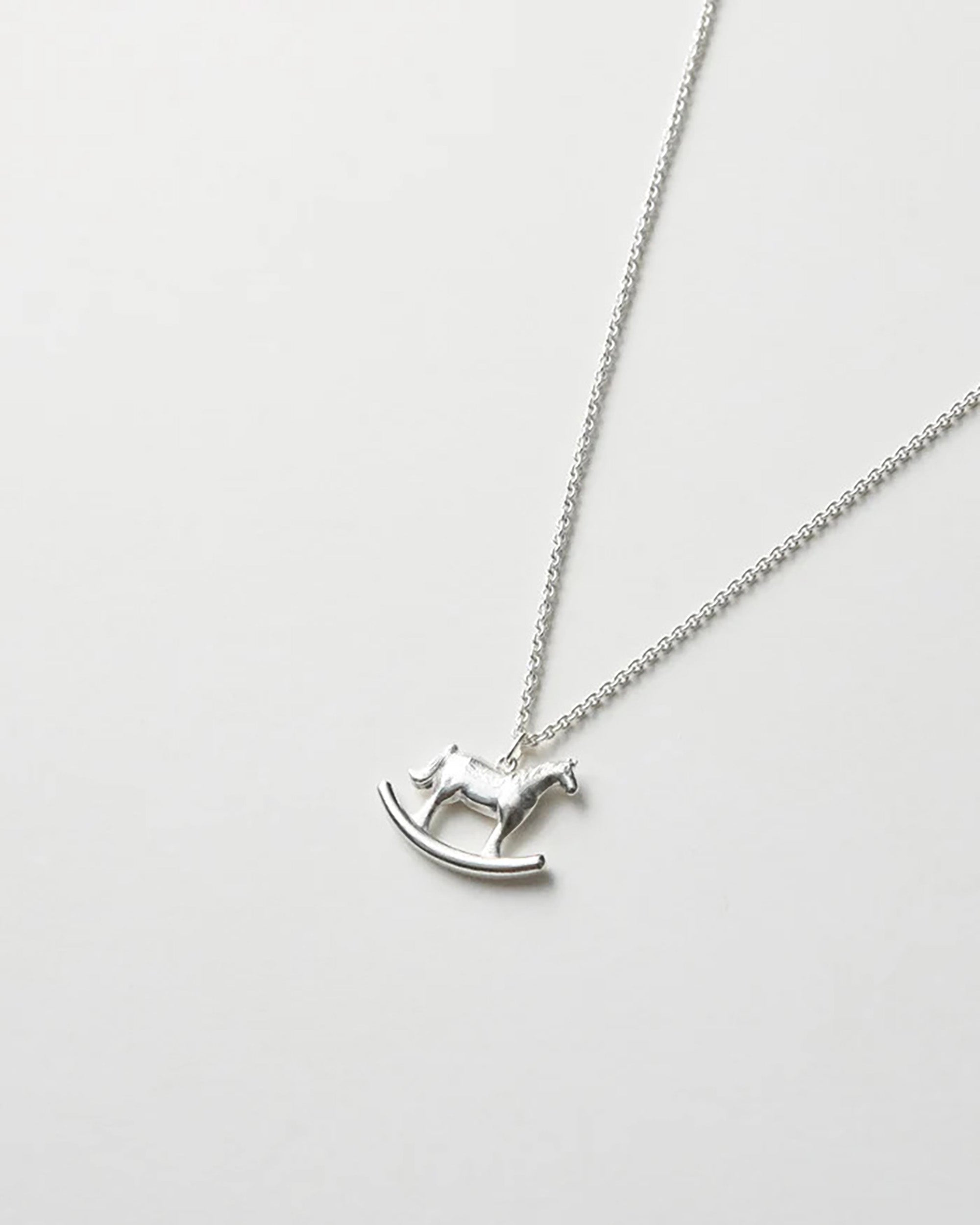 AIDA IMPACT Rocking Horse Silver Necklace